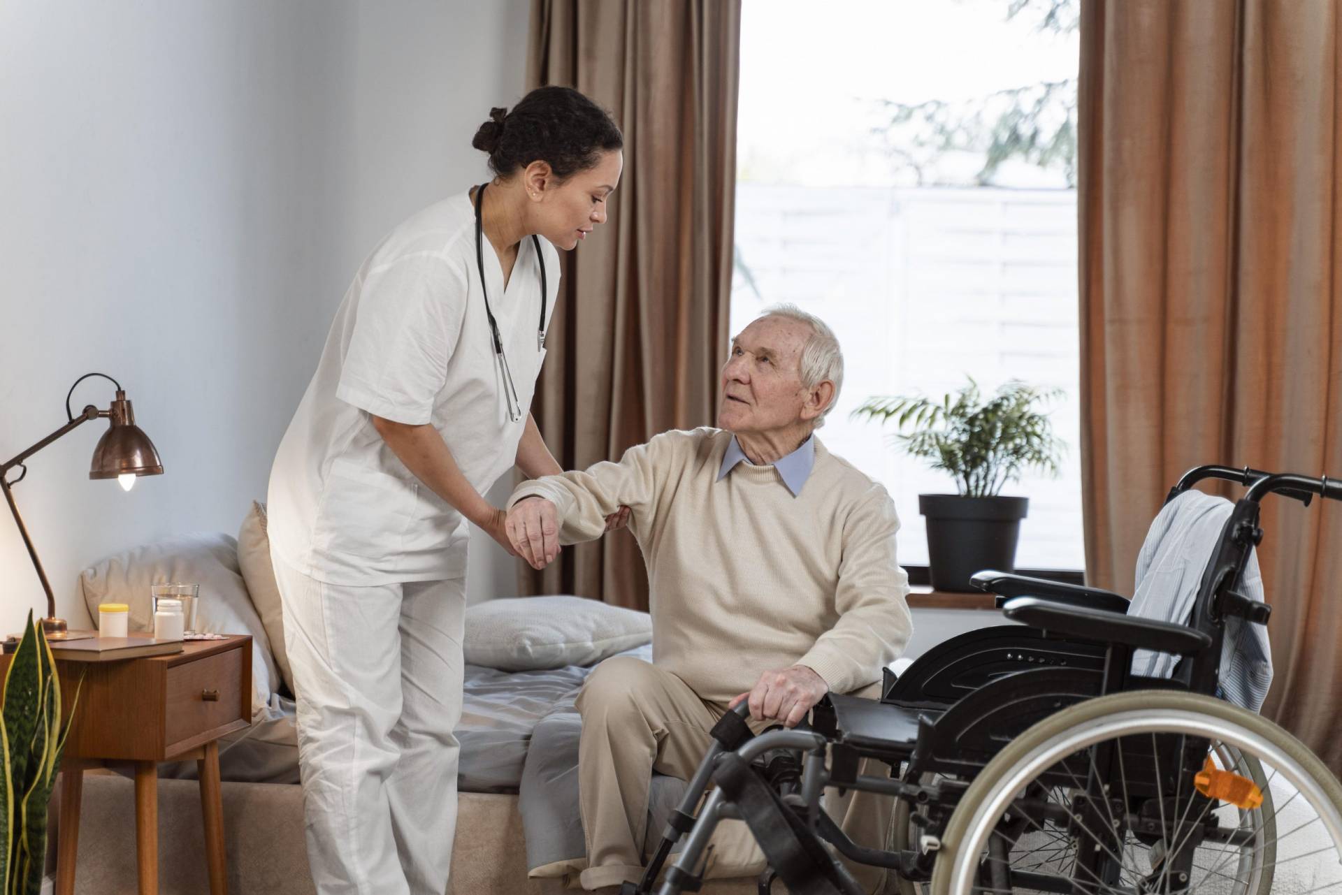 Home doctor helping senior patient